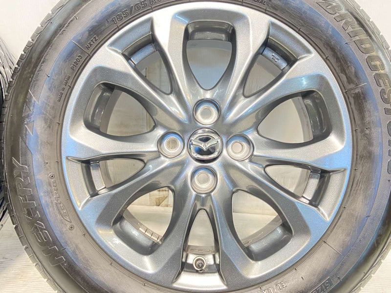 ブリヂストン ネクストリー 185/65R15 /マツダ純正 5.5J+40 100-4穴 4  